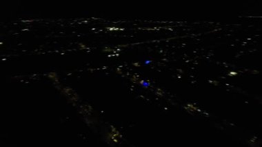 Night Aerial View of Illuminated British City. Drone's Footage of Luton Town of England at Night