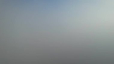 Most Beautiful Aerial View of Above the Clouds in the Morning. Dramatically fast moving clouds