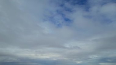 Most Beautiful Aerial View of Above the Clouds in the Morning. Dramatically fast moving clouds