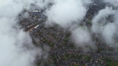 Most Beautiful Aerial View of Above the Clouds in the Morning. Dramatically fast moving clouds