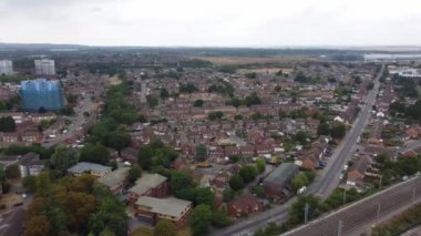 Aerial view of British Town Centre of Luton England with Railway Station and Train on Track