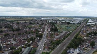 England, Luton - 5th July, 2023: Aerial view of of Luton England with Railway Station and Train on Track