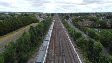 England, Luton - 5th July, 2023: Aerial view of of Luton England with Railway Station and Train on Track