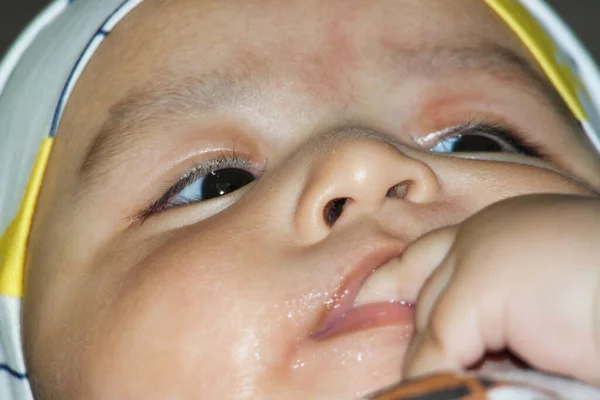 stock image Close Up Shot of Cute Asian Pakistani 4 Months Old Baby Boy, Who is Enjoying at Home Garden at Luton City of England UK. Image Was Captured on July 23rd, 2023