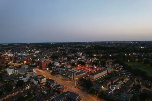 stock image Aerial View of Illuminated Downtown Buildings, Roads and Central Luton City of England UK at Beginning of Clear Weather Night of September 5th, 2023