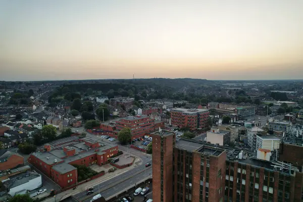 Stock image Aerial View of Illuminated Downtown Buildings, Roads and Central Luton City of England UK at Beginning of Clear Weather Night of September 5th, 2023