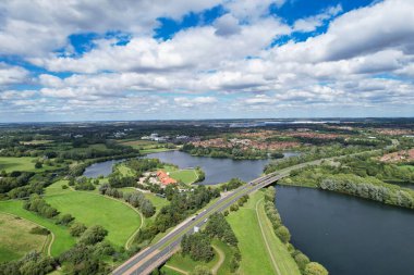  Milton Keynes, England, United Kingdom - May 21, 2023: aerial view of Caldecotte Lake  clipart