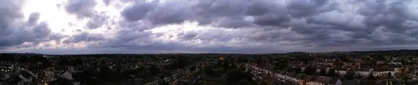 High Angle Panoramic View of Dramatic Sky and clouds over Luton City of England UK After Sunset. Image Captured with Drone\'s Camera on September 27th, 2023
