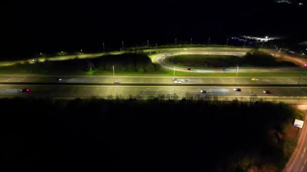 Повітряні Нічні Кадри Освітлених Британських Автомагістралей Руху Junction Заході Сонця — стокове відео