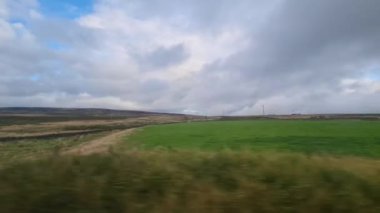 İngiltere Gölü Bölgesi 'ne giden Carlisle' ın tren yolculuğu sırasındaki yan pencere görüntüsü. 3 Eylül 2024