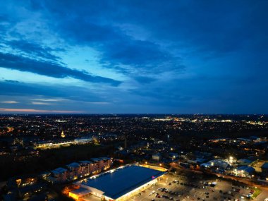 Aerial View of Illuminated Central Cambridge City of Cambridgeshire of England UK During Night. High Angle Footage Was Captured with Drone's Camera at Just After Sunset on March 22nd, 2024 clipart