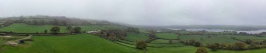 High Angle Panoramic View of British Agricultural Farms at Gorgeous Countryside Landscape of England Great Britain of United Kingdom. Footage Was Captured with Drone's Camera from Medium High Altitude. clipart