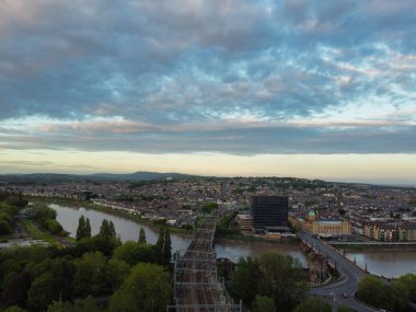 High Angle View of Newport City on River Usk Wales, United Kingdom During Sunset. Aerial Footage Was Captured with Drone's Camera on May 27th, 2024 clipart