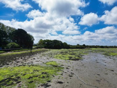 High Angle Footage of Beautiful and Peaceful Tourist Attraction of Stock Havant Hayling Beach and Ocean on Hayling Island and Former Civil Parish, Havant Hampshire, South East England Great Britain. Captured with Drone's Camera on May 15th, 2024 clipart