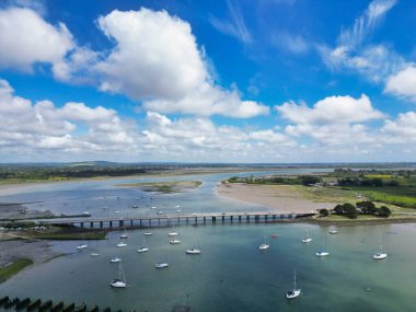 High Angle Footage of Beautiful and Peaceful Tourist Attraction of Stock Havant Hayling Beach and Ocean on Hayling Island and Former Civil Parish, Havant Hampshire, South East England Great Britain. Captured with Drone's Camera on May 15th, 2024 clipart