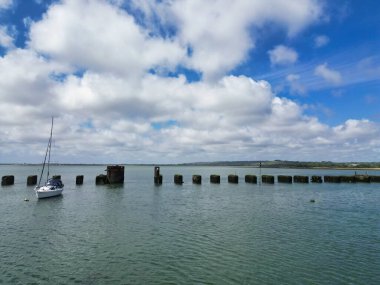 High Angle Footage of Beautiful and Peaceful Tourist Attraction of Stock Havant Hayling Beach and Ocean on Hayling Island and Former Civil Parish, Havant Hampshire, South East England Great Britain. Captured with Drone's Camera on May 15th, 2024 clipart