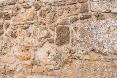 Gri ve bej taş duvar arkaplan dokusu