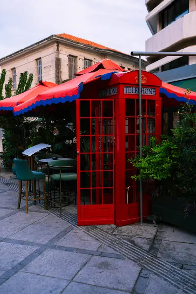 stock image Traditional now extinct old red telephone box from england, with copy space