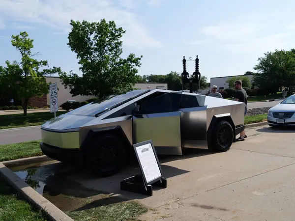 stock image Olathe, Kansas - June 8, 2024: Tesla Cybertruck with Replica Gun - Cyberpunk Style Electric Vehicle