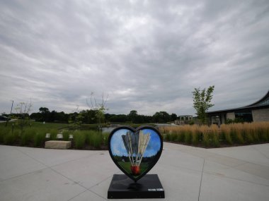 Overland Park, Kansas - August 10, 2024: Shuttlecock Kansas City Heart at the Overland Park Arboretum clipart