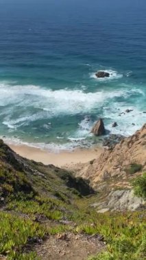 Ocean Waves Crushing on Rocky Shoreline