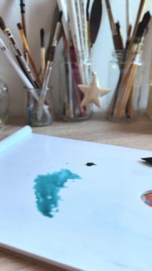 Creative Process of Mixing Colors on the Artist's Palette