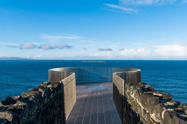 Viewing platform at the Magheracross Viewing Point above the sea and offshore islands along Northern Ireland\'s Causeway Coast
