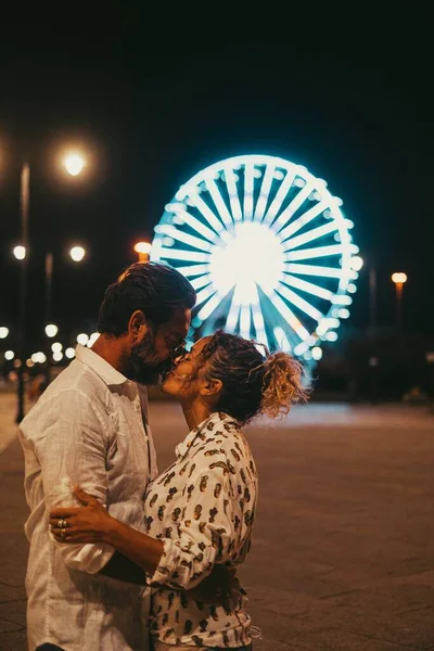 Loving Couple Embracing Kissing Each Other Passionately Street Illuminated Ferris — Stock Photo, Image