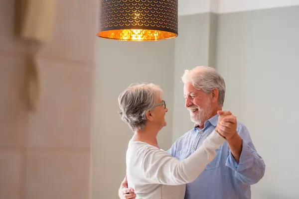 Joyful Active Old Retired Romantic Couple Dancing Laughing Living Room — Stock Photo, Image