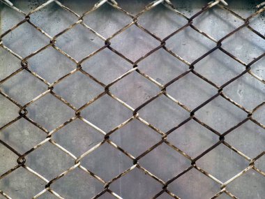 Elmas şekilli bir ağ kablosu, eşsiz bir tasarım ile gücü gösteriyor, dokusu gri arka plana karşı.