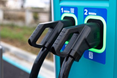 charging station for electric vehicles. Symbol of new ecological mobility