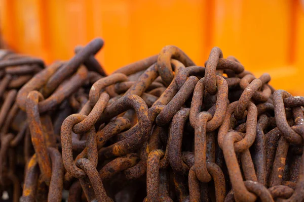 close up of a pile of rusty chains. Can be used as a texture page background and background