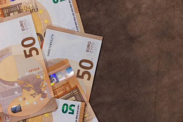 Kahverengi Arka Planda Euro Luk Banknot Yığını — Stok fotoğraf