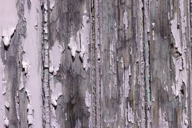 Eski ahşap kalaslardan yapılmış, yeşil boyayla kaplanmış. Kapıları, panjurları ya da çitleri kapatın.