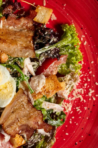 Caesar Salad Breaded Chicken Grilled Bacon Red Ceramic Plate Dark — Stock Photo, Image
