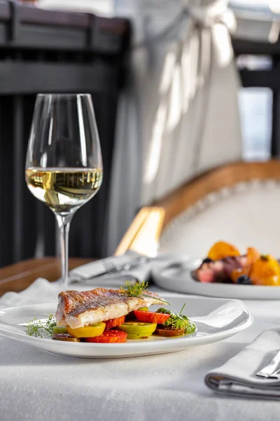 Three Course Dinner White Wine Eggplant Tomatoes Sea Bass Vegetables — Stock Photo, Image