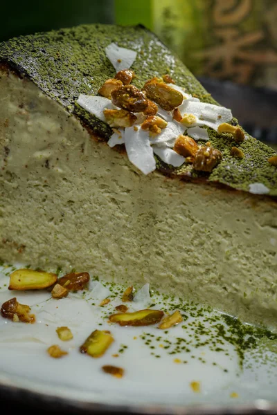 Matcha Cheesecake Pistachio Nuts Coconut Chips Topped Green Tea Powder — Stock Photo, Image