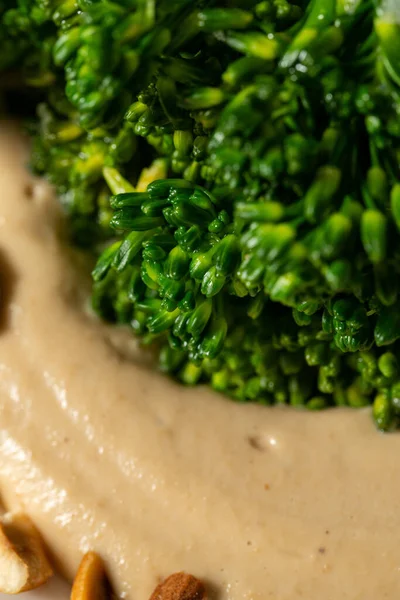 Grilled Broccoli Sprouts Walnut Sauce Peanuts Light Ceramic Plate Dish — Stock Photo, Image