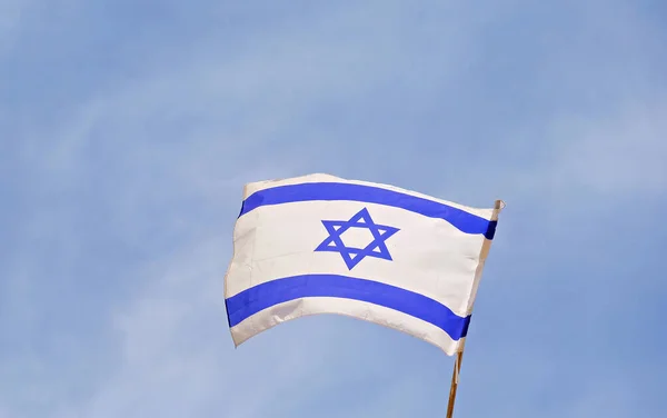 75 years since the founding of the State of Israel.Flag of Israel. State symbol.Flag of Israel on the background of the Wailing Wall.