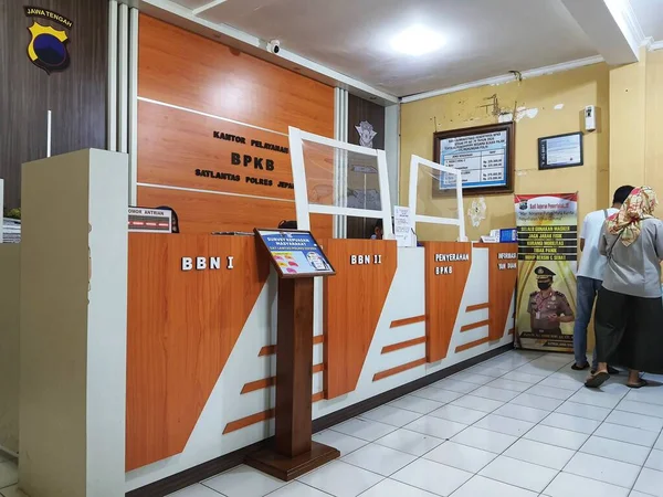 stock image Central Java, Indonesia in October 2022. Several people are queuing and waiting at the BPKB service office or vehicle certificate of ownership at the Jepara Police. This service is open from Monday to Saturday.