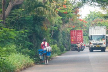Jakarta, Indonesia in November 2022. Itinerant siomay sellers selling by bicycle. The price of dumplings being sold is cheaper than dumplings with better quality.