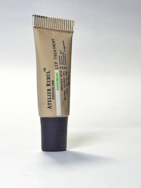 Turkey on July 2022. Isolated photo of A traveler's toilteries portion of Atelier Rebul Depuis 1895 Peppermint Lip Treatment. One of the items that is obtained for free when using a Turkish Airlines plane.