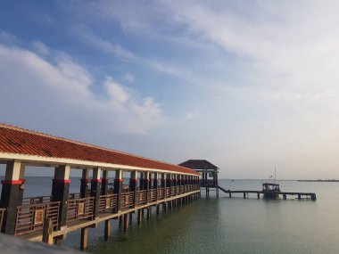 A pier for anchor ships and small boats on a beach called Tirta Samudera Beach or Bandengan Beach in Jepara City.