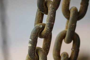 Steel chains that are rusty but still have a pretty good quality and can still be used to pull heavy things.