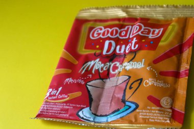 Jakarta, Indonesia in December 2022. Isolated oto from coffee sachets, a new variant of Good Day, Good Day Duet Moca Caramel. Mix Good Day coffee Moccacinno flavor with Rocksalt Caramello in 1 sachet. The taste is unique and delicious.