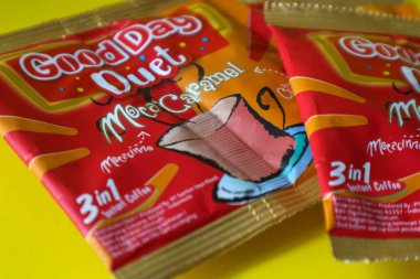 Jakarta, Indonesia in December 2022. Isolated oto from coffee sachets, a new variant of Good Day, Good Day Duet Moca Caramel. Mix Good Day coffee Moccacinno flavor with Rocksalt Caramello in 1 sachet. The taste is unique and delicious.