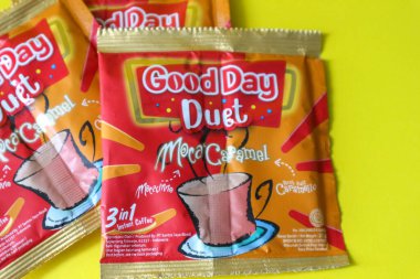 Jakarta, Indonesia in December 2022. Isolated oto from coffee sachets, a new variant of Good Day, Good Day Duet Moca Caramel. Mix Good Day coffee Moccacinno flavor with Rocksalt Caramello in 1 sachet. The taste is unique and delicious.