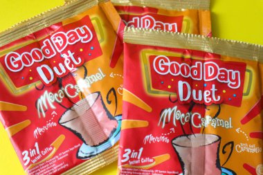 Jakarta, Indonesia in December 2022. Isolated oto from coffee sachets, a new variant of Good Day, Good Day Duet Moca Caramel. Mix Good Day coffee Moccacinno flavor with Rocksalt Caramello in 1 sachet. The taste is unique and delicious.