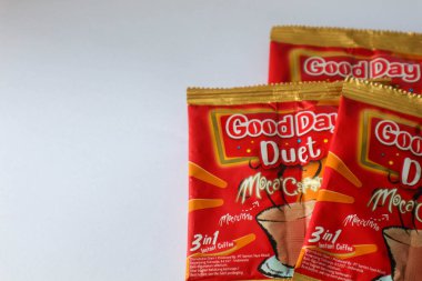 Jakarta, Indonesia in December 2022. Isolated oto from coffee sachets, a new variant of Good Day, Good Day Duet Moca Caramel. Mix Good Day coffee Moccacinno flavor with Rocksalt Caramello in 1 sachet. The taste is unique and delicious.