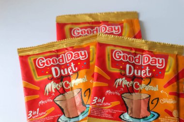Jakarta, Indonesia in December 2022. Isolated oto from coffee sachets, a new variant of Good Day, Good Day Duet Moca Caramel. Mix Good Day coffee Moccacinno flavor with Rocksalt Caramello in 1 sachet. The taste is unique and delicious.